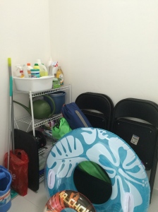 Using the bomb shelter to store cleaning supplies, folding table and chairs, and pool toys